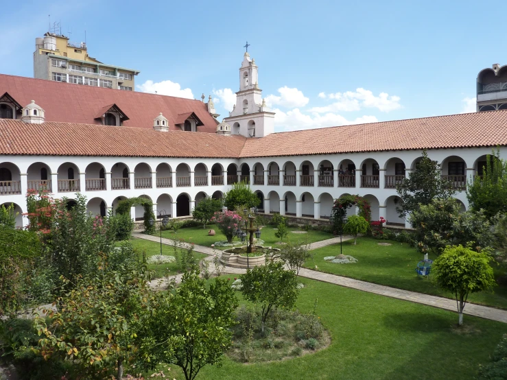 a courtyard in front of an historical building