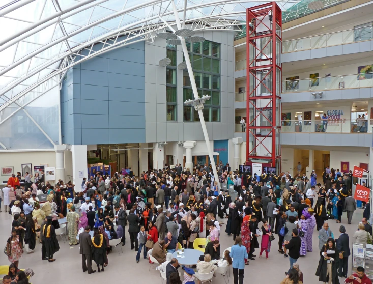 a large group of people gathered in an open space