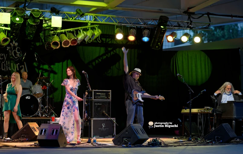 a band performing on a stage at an event