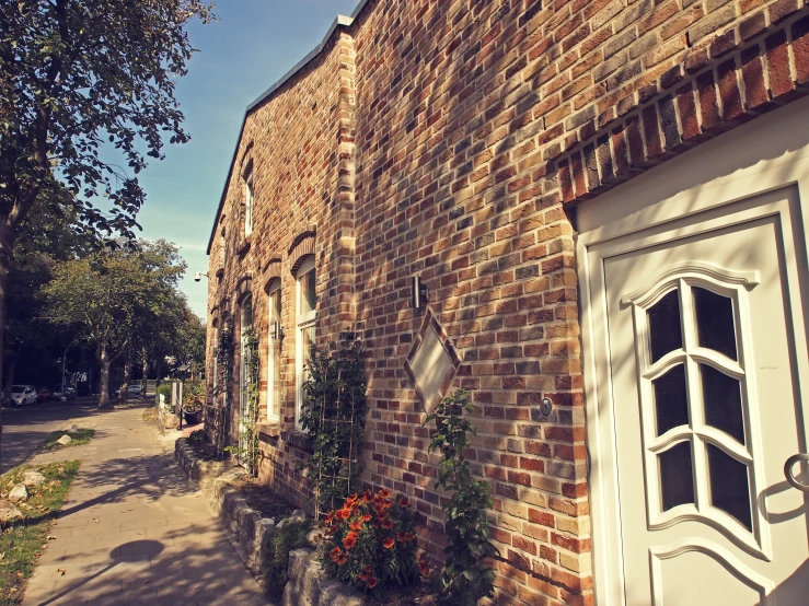 a brick building with a white door on it's sides