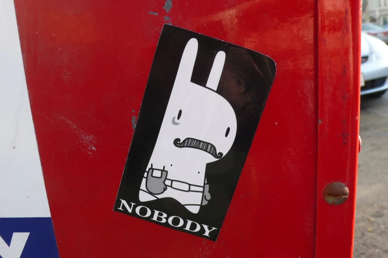 the sticker of a rabbit on the side of the vehicle says nobody