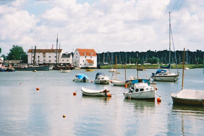 several boats are in a large body of water