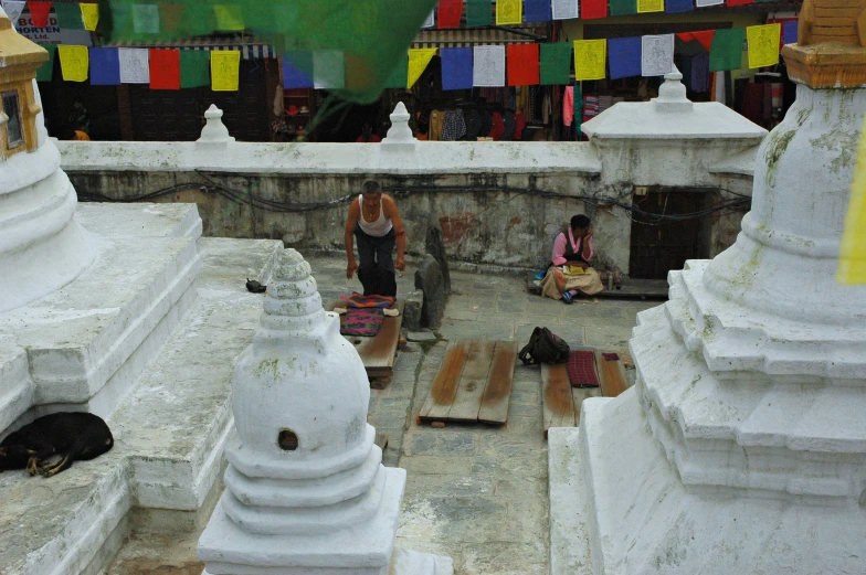 a group of statues surrounding a small courtyard