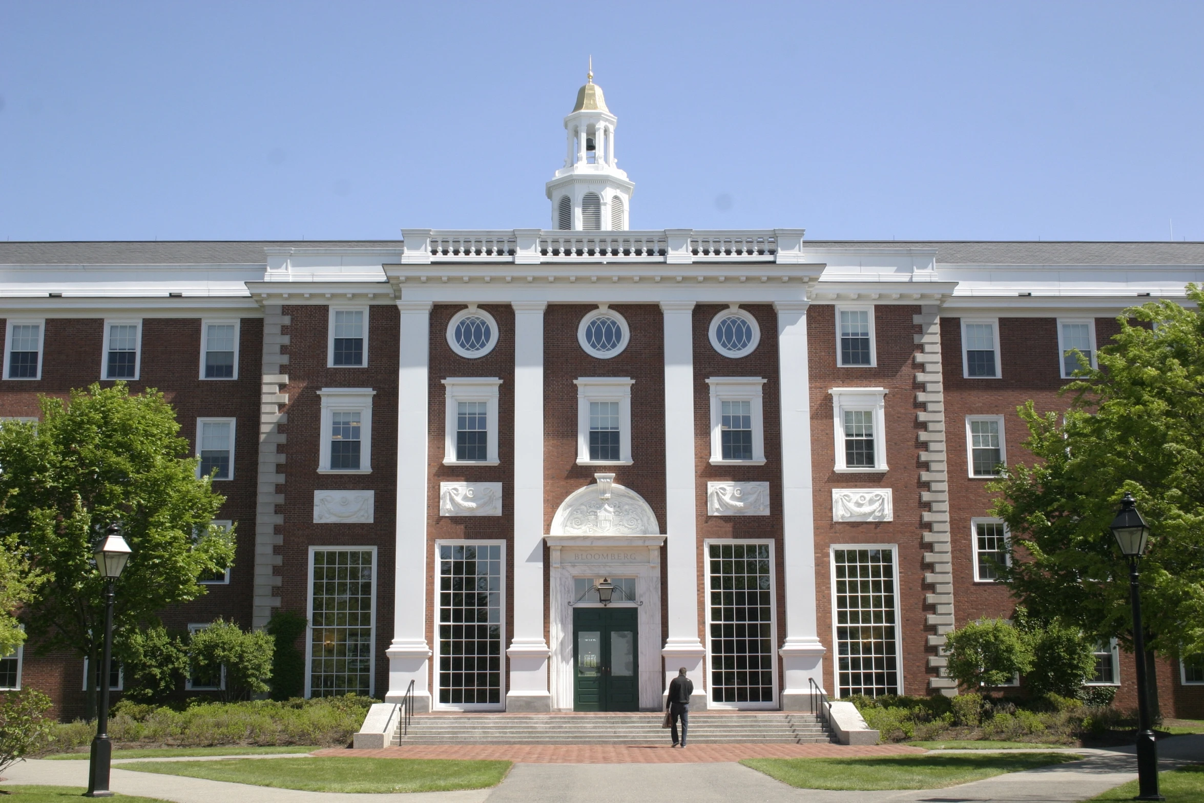 the front of the large building with two pillars