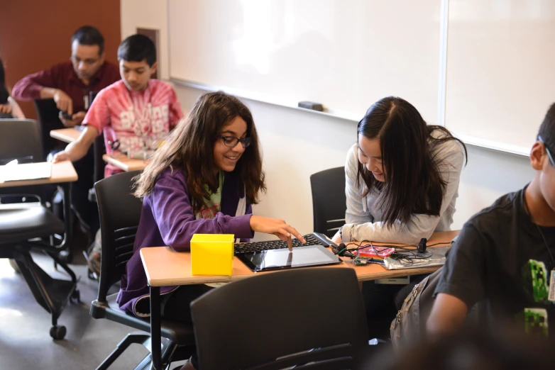 some students are studying in a classroom