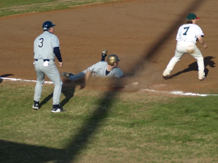 some baseball players on the field playing baseball