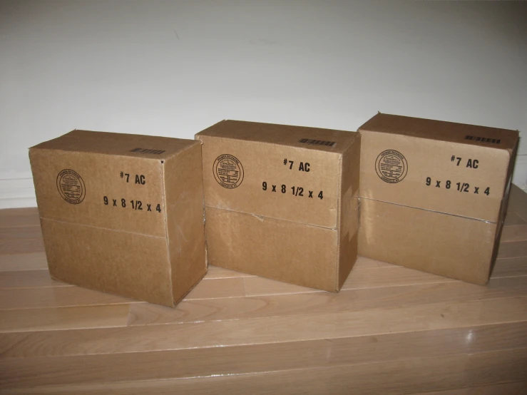 three boxes are arranged on the ground for storage