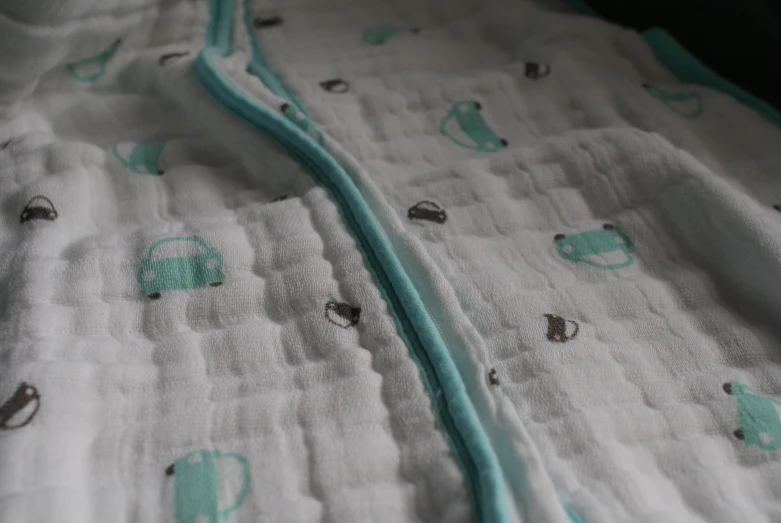 a bed and comforter covered with a pattern