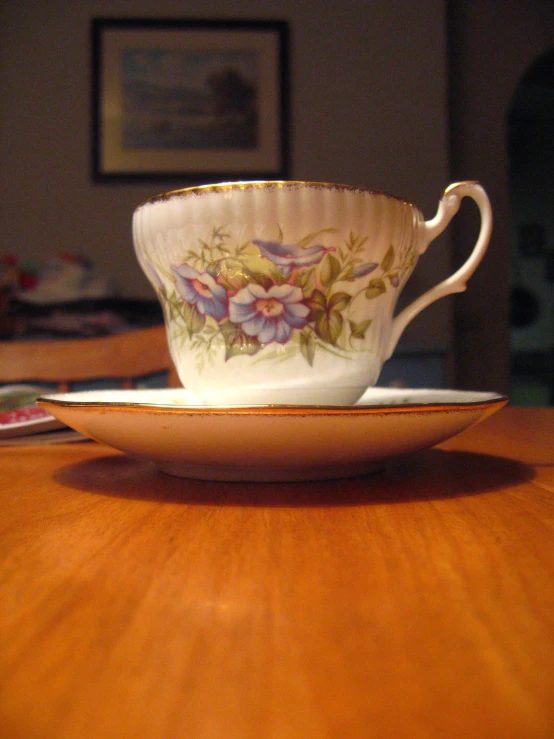 this is an image of coffee cup and saucer