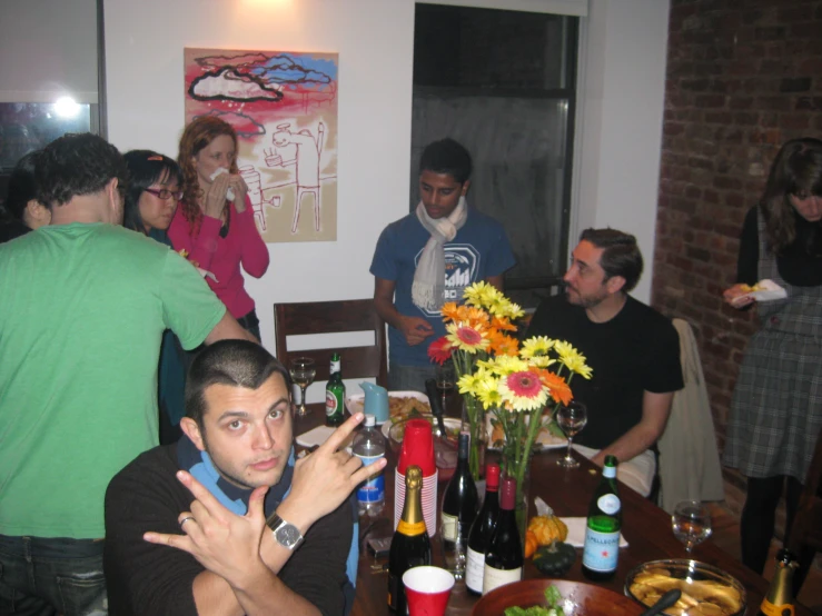 a group of people gathered around a table