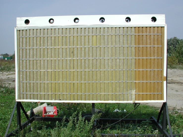 a wooden board on top of a cart with wheels