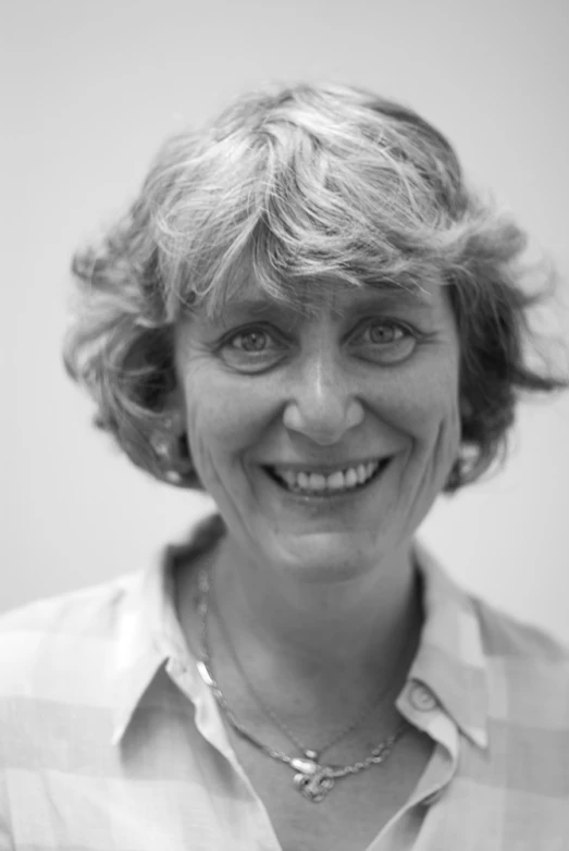 black and white pograph of a lady wearing necklace