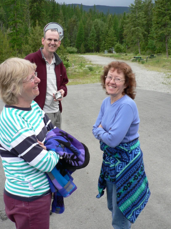 two women that are standing next to each other