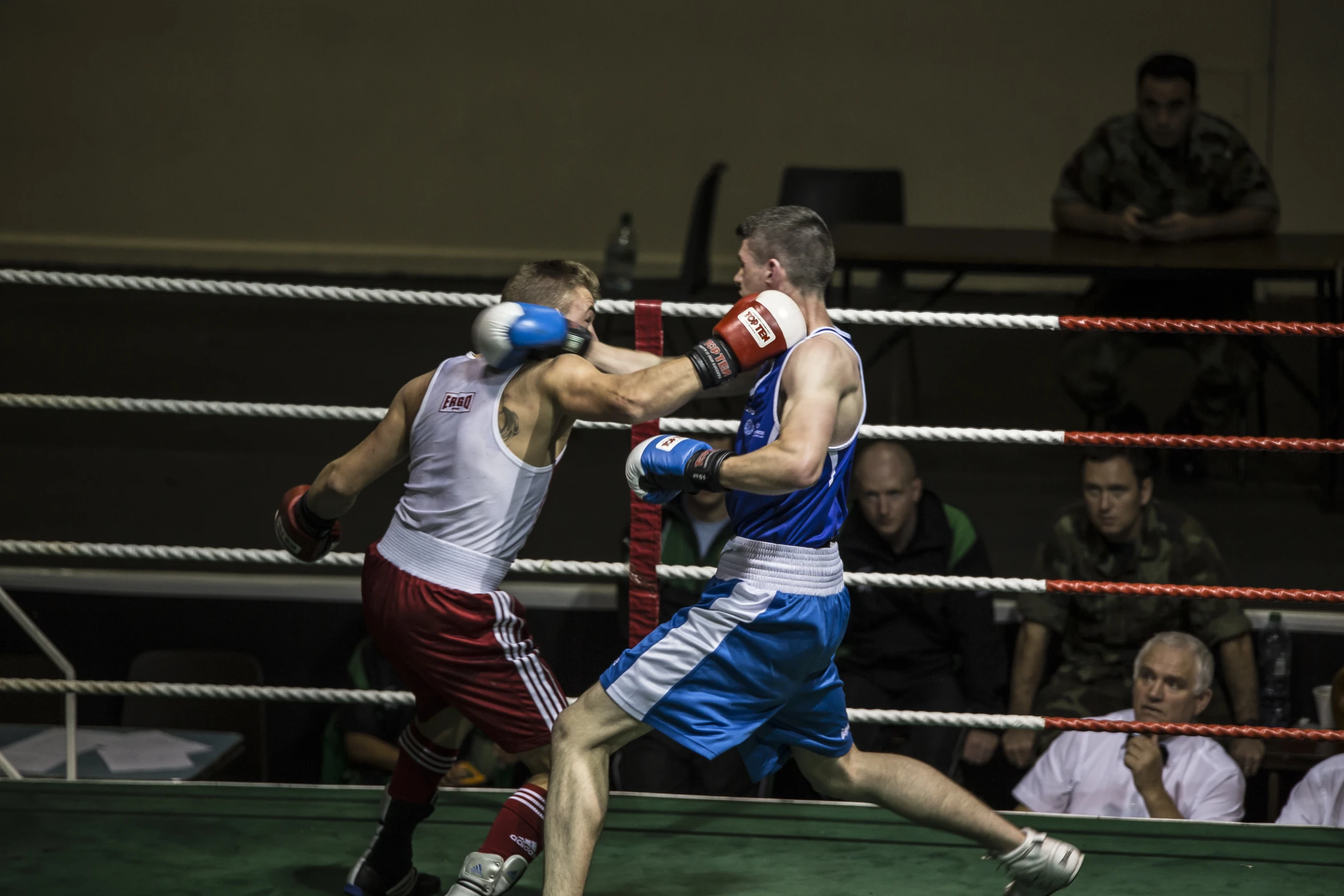 two boxing boxers in action during an event