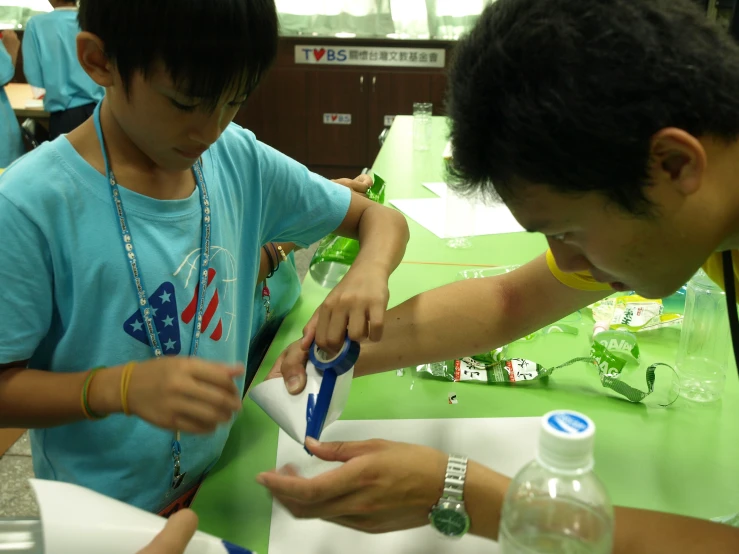 the man and  are preparing items on the table