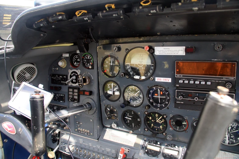 some different gauges and switches are in a very big plane