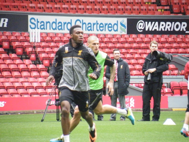 a man playing a game of soccer on a field