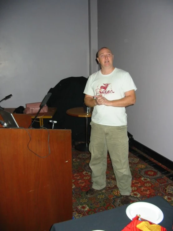 a man standing in front of a podium