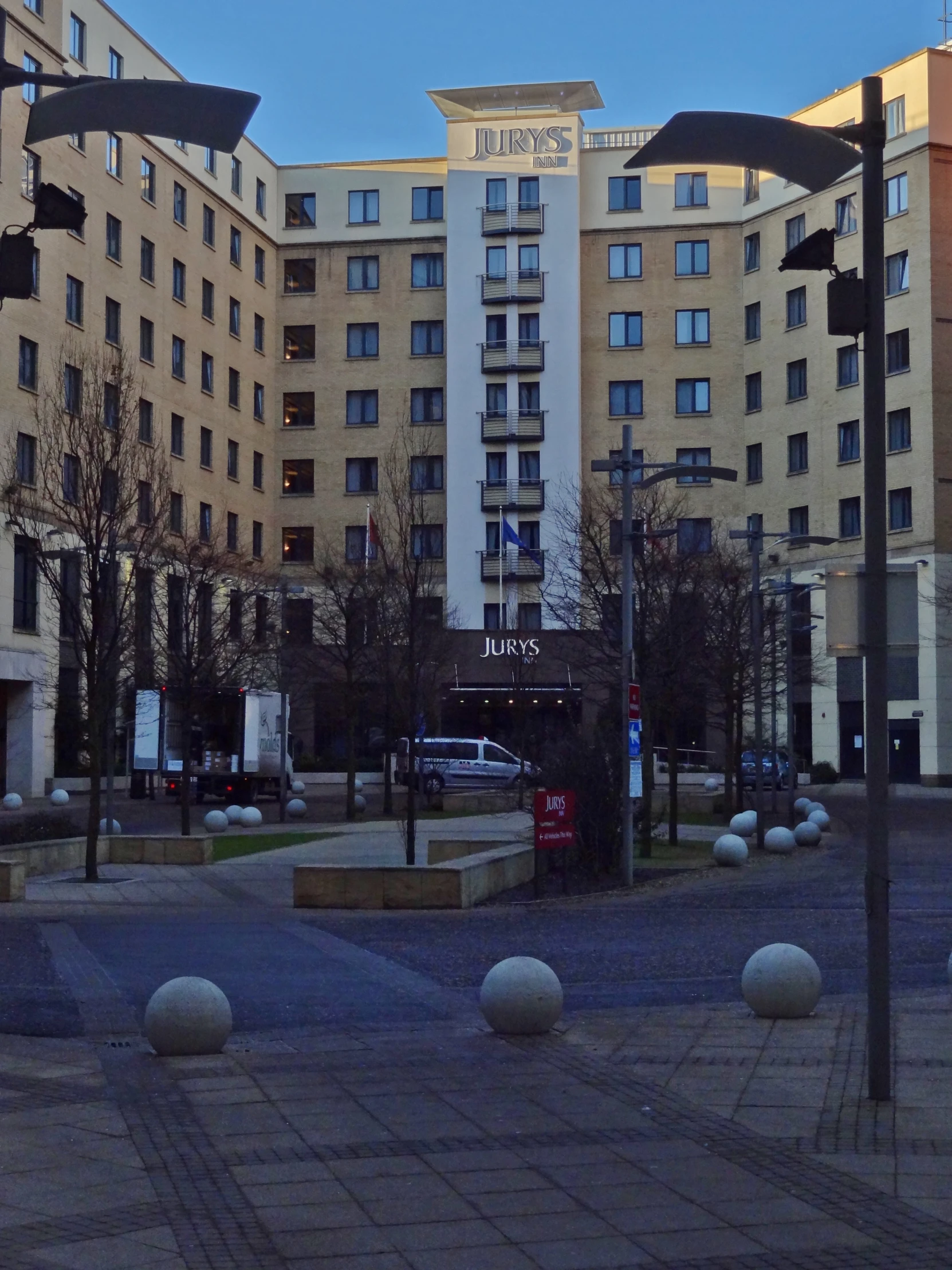 a street scene with lights and buildings