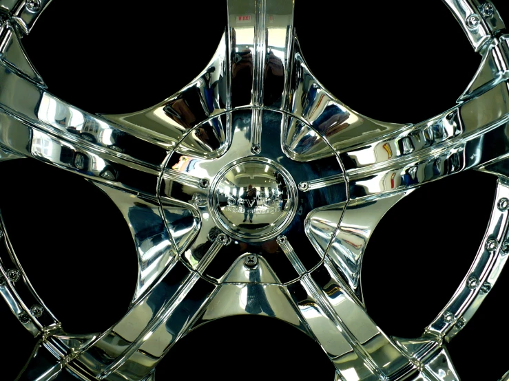 an all chrome colored wheel with wheels painted shiny