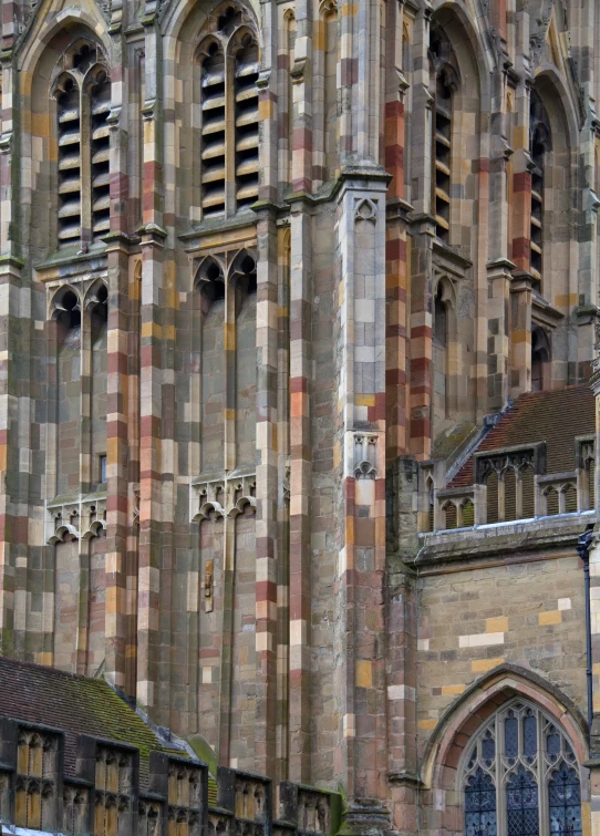 a picture of a large old church with stone work