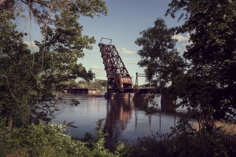 an old bridge has been built on one of two sides