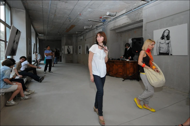 the woman in a black shirt is walking with another woman