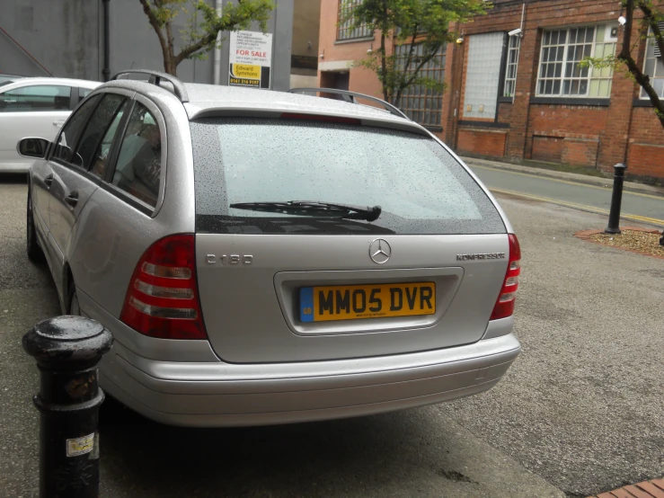 the rear view of a car is on the street