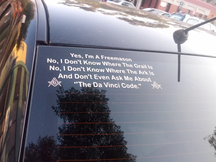 stickers written on the windshield of a car