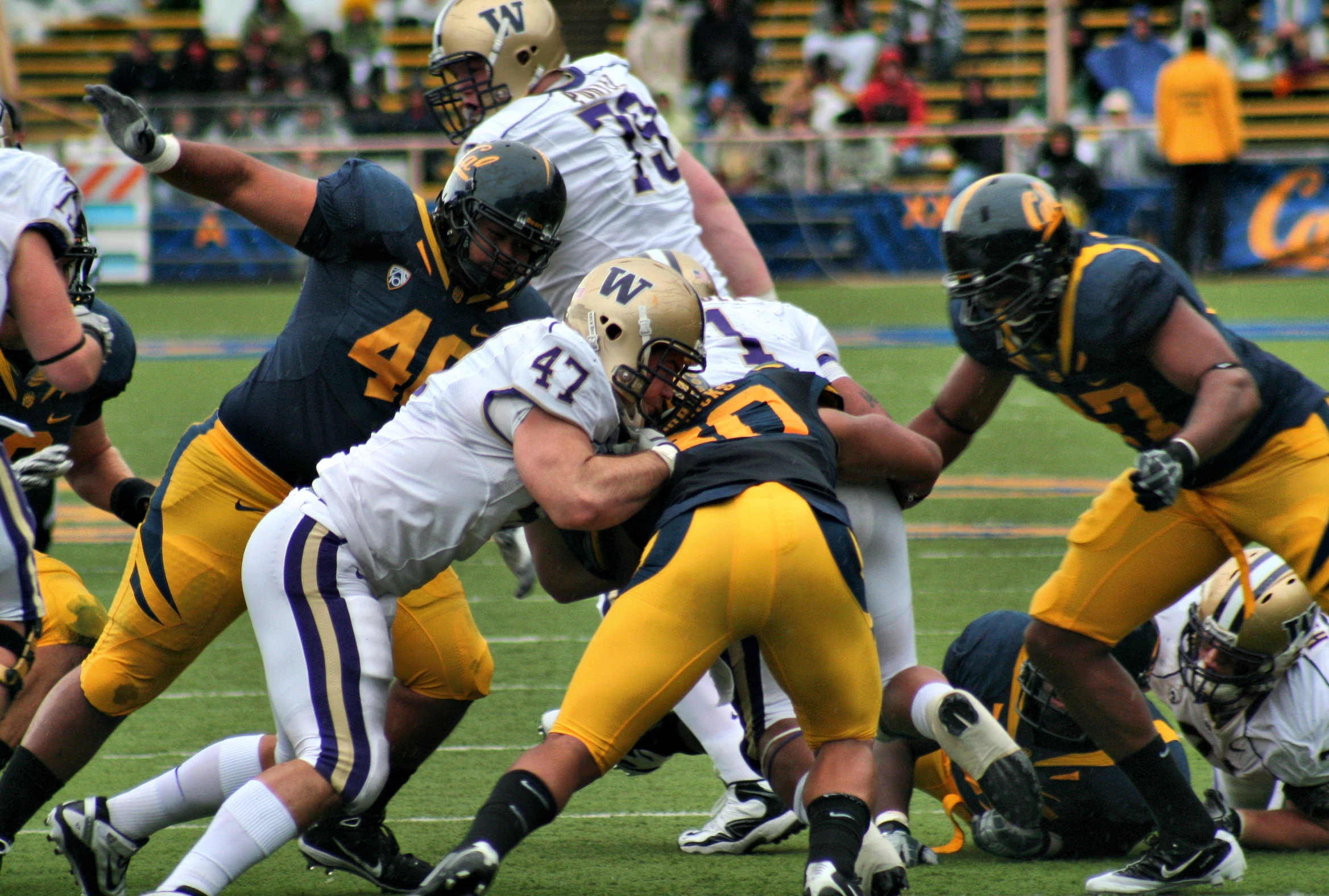 an american football player on the sidelines