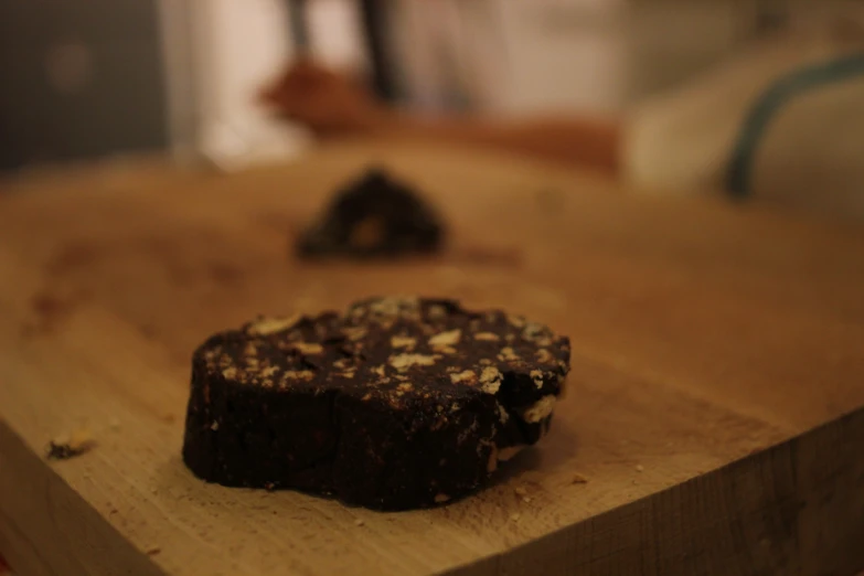 a wooden surface with chocolate in the middle