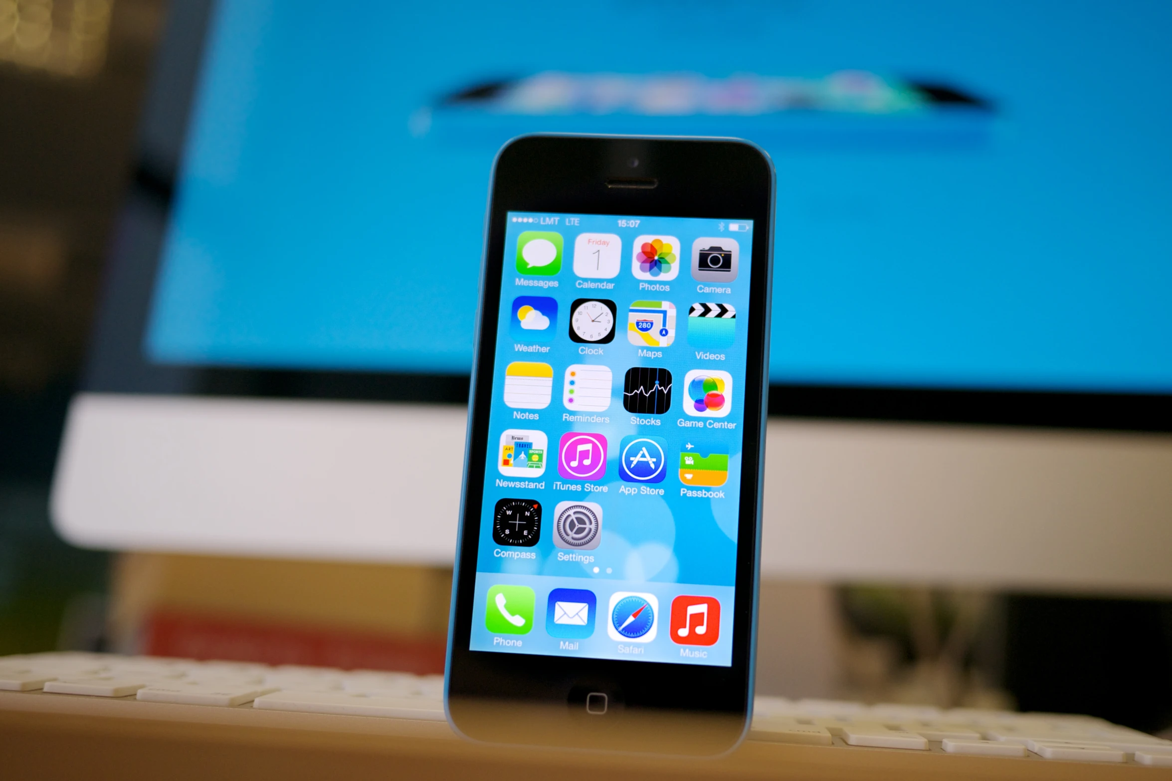 an iphone sitting on top of a desk