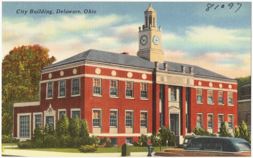 this is a postcard with a building and a clock tower