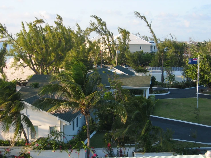 an aerial view of a suburban neighborhood by the beach