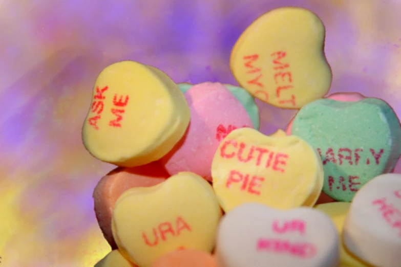 a close up of candies with some writing on them