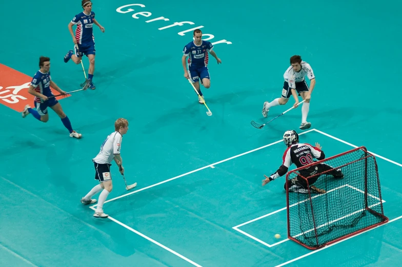 a group of men playing a game of tennis