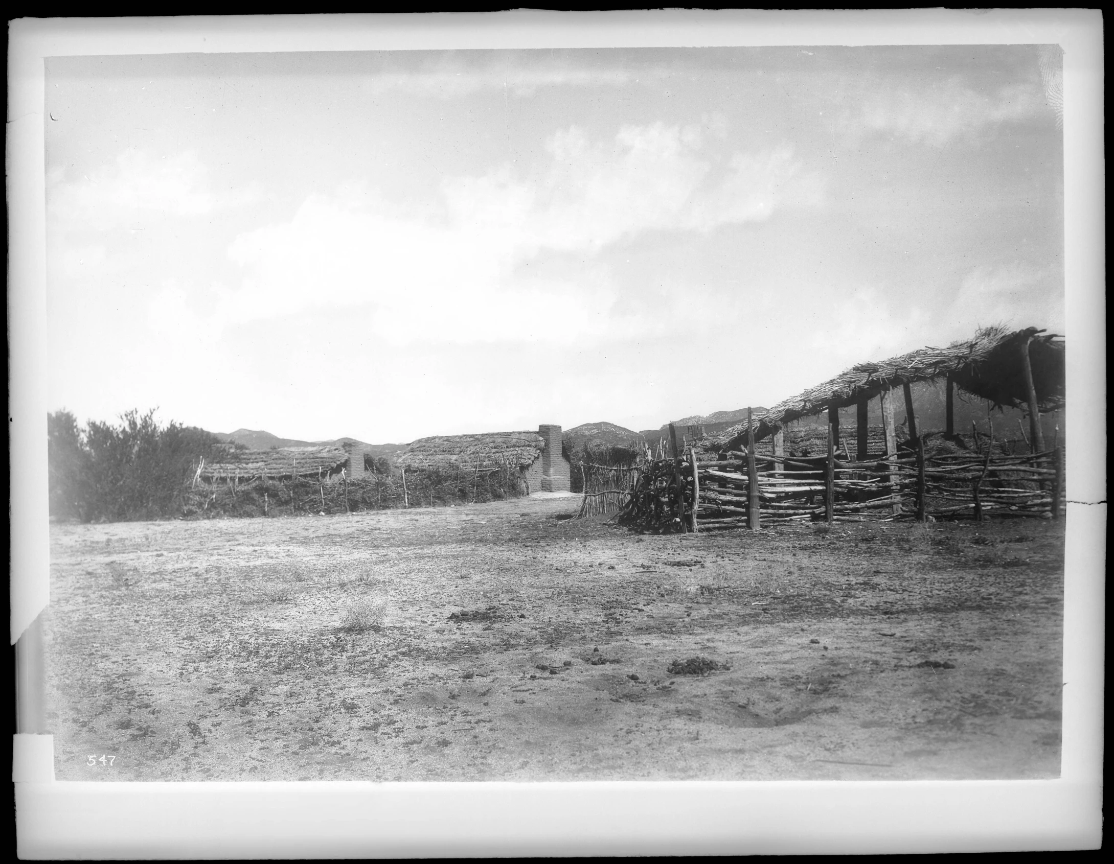 a black and white po of a hay field