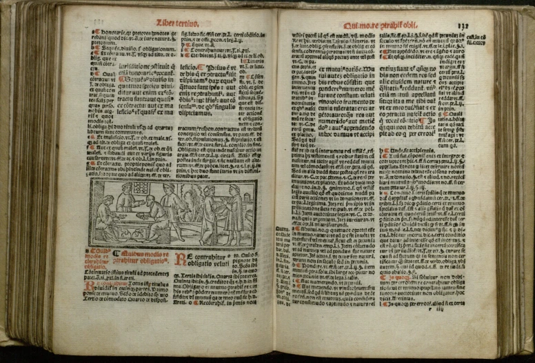 a page in a medieval book is opened