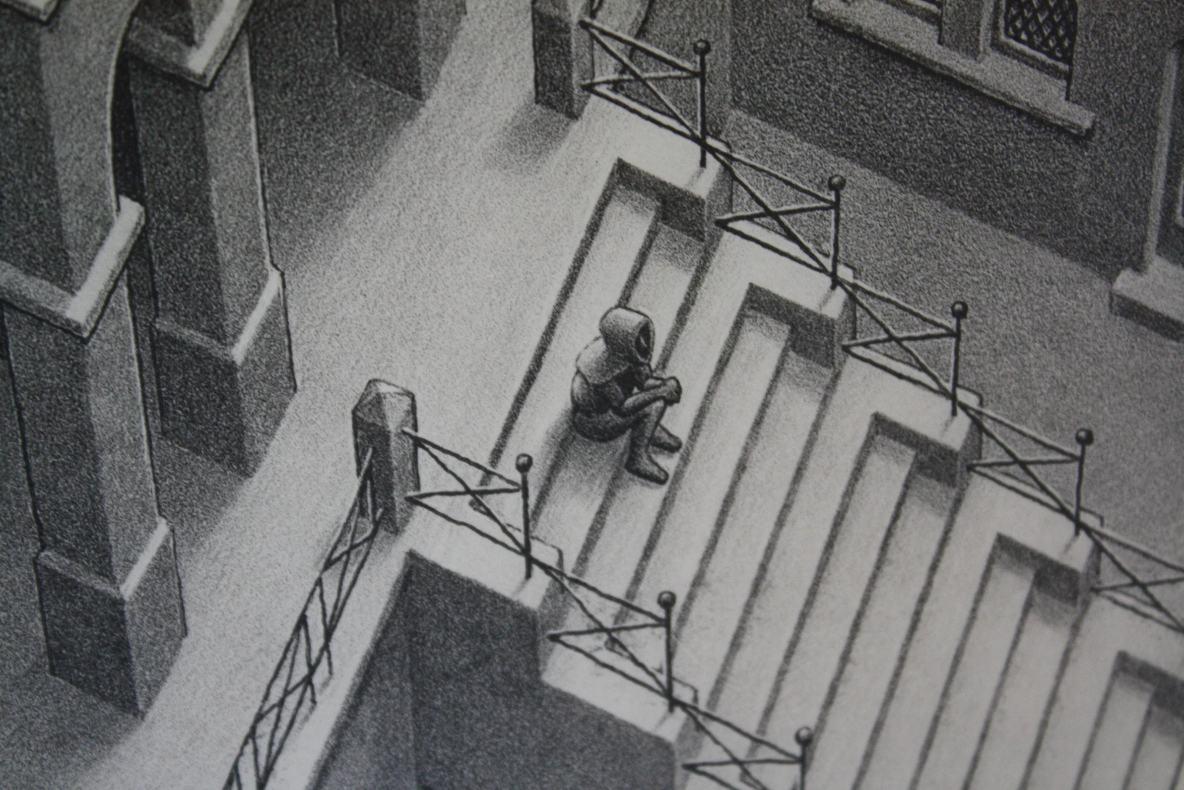 black and white drawing of people sitting on steps next to a staircase