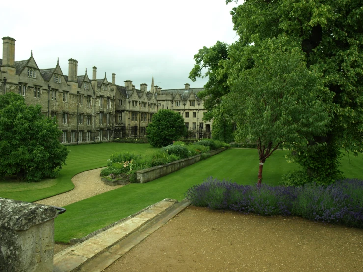 a large, historical building with a pathway in the center