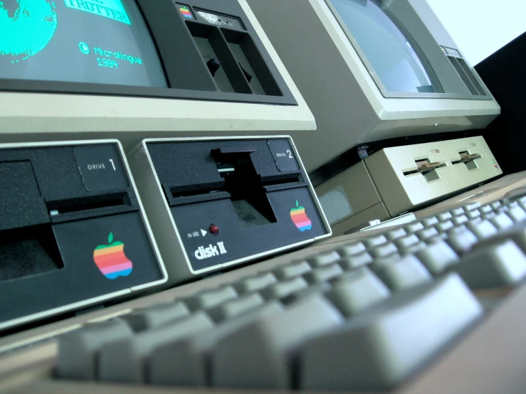 old computer equipment sitting on top of a desk