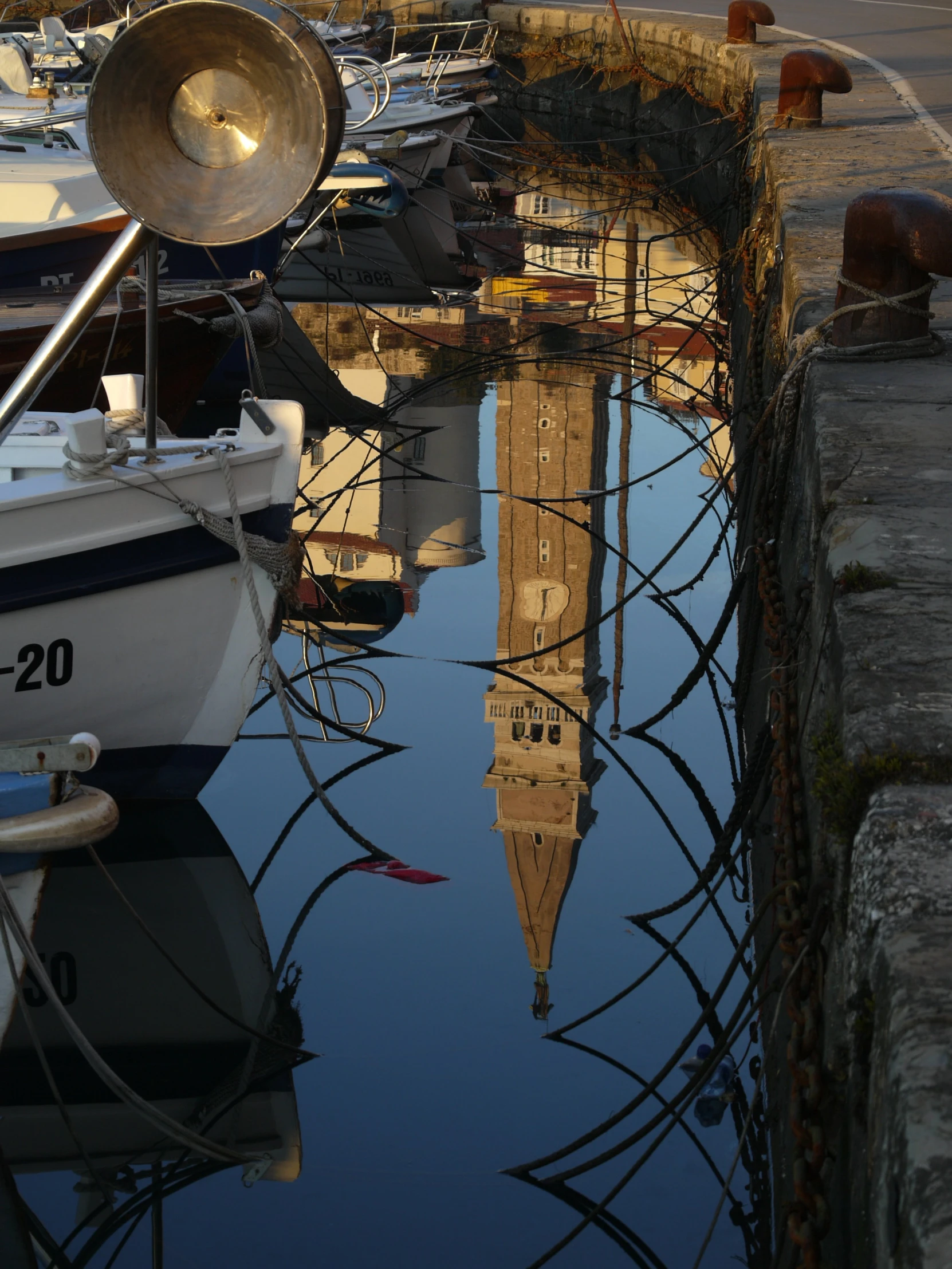 some boats are sitting in the water