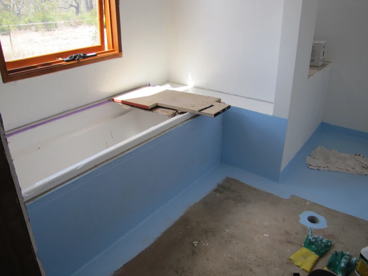 a room that has been painted with some blue paint