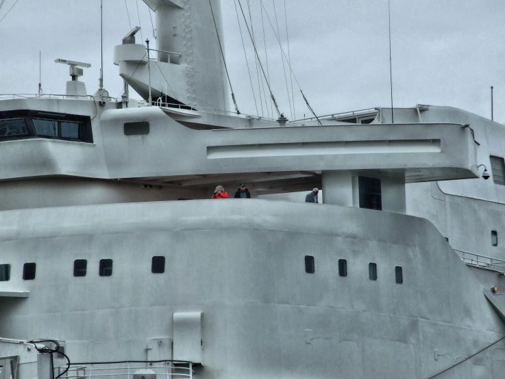 a large boat is docked in a harbor