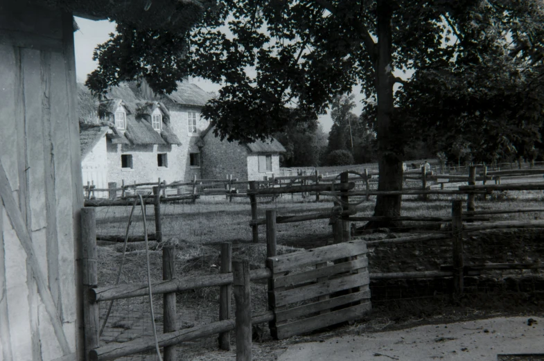 an old po with a house in the back