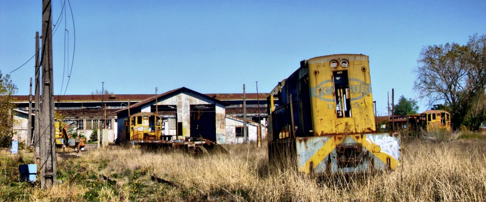 an old abandoned building in the middle of nowhere