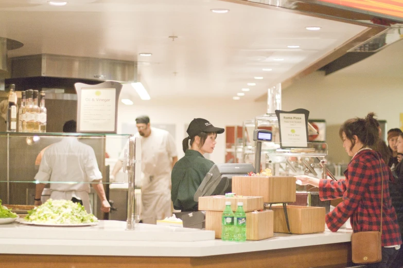 the group of men in a fast food place with two guys talking