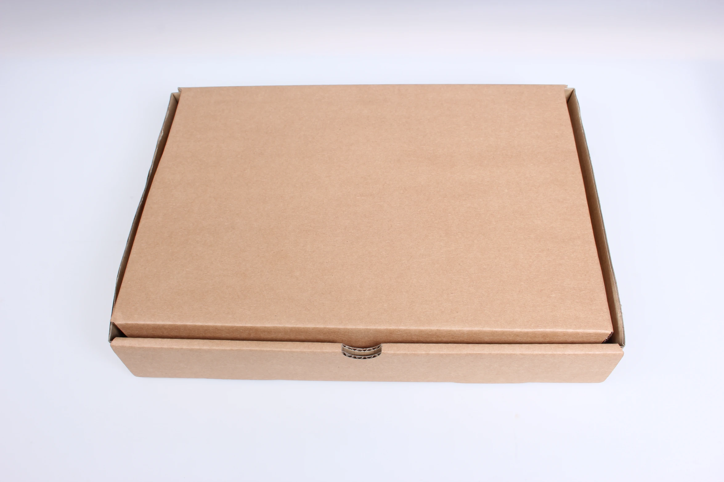 a closed box with a brown lid and bottom