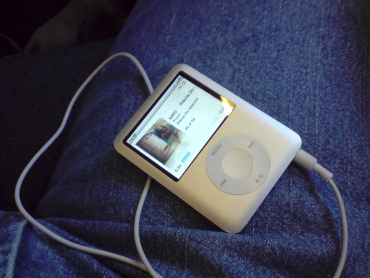 an old ipod sits on the back of someone