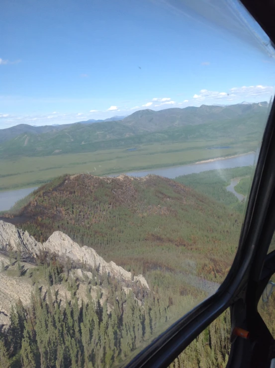 view of the landscape from a plane window